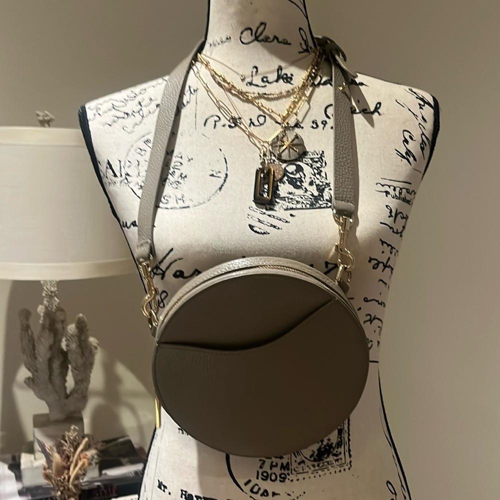 Cuyana taupe crossbody/waistbag with adjustable and removable strap.